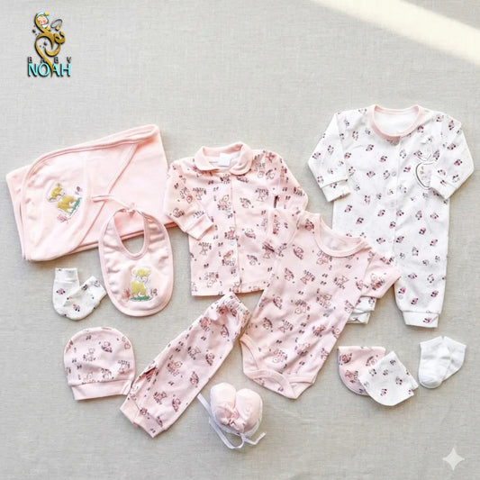 طقم ولادة 12 قطعة خامة قطن معالجة ضد الحساسية رسمة غزالة بنت تغليف علبة 
